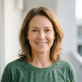 Java Brain customer review portrait of a smiling woman